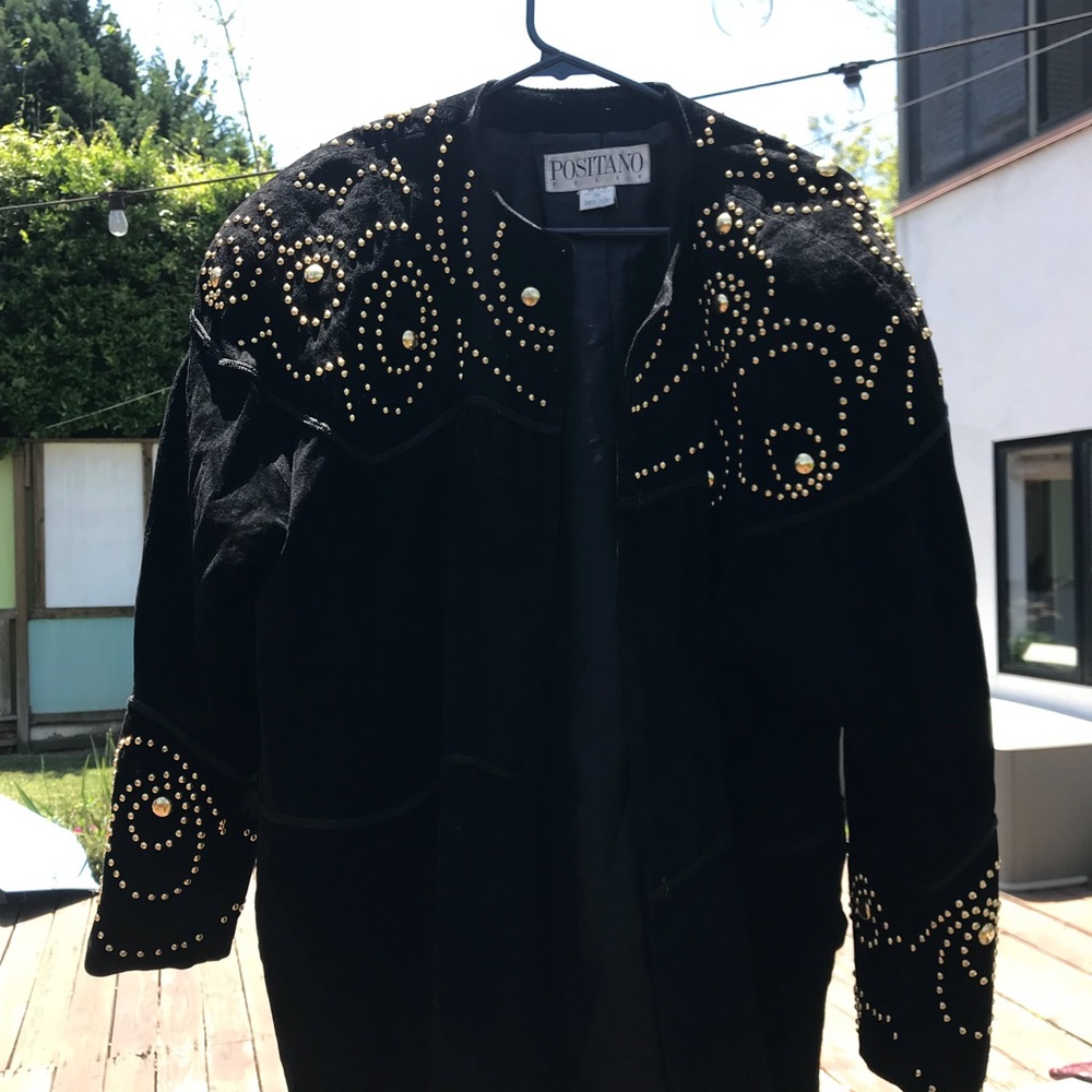 Gold studded leather coat